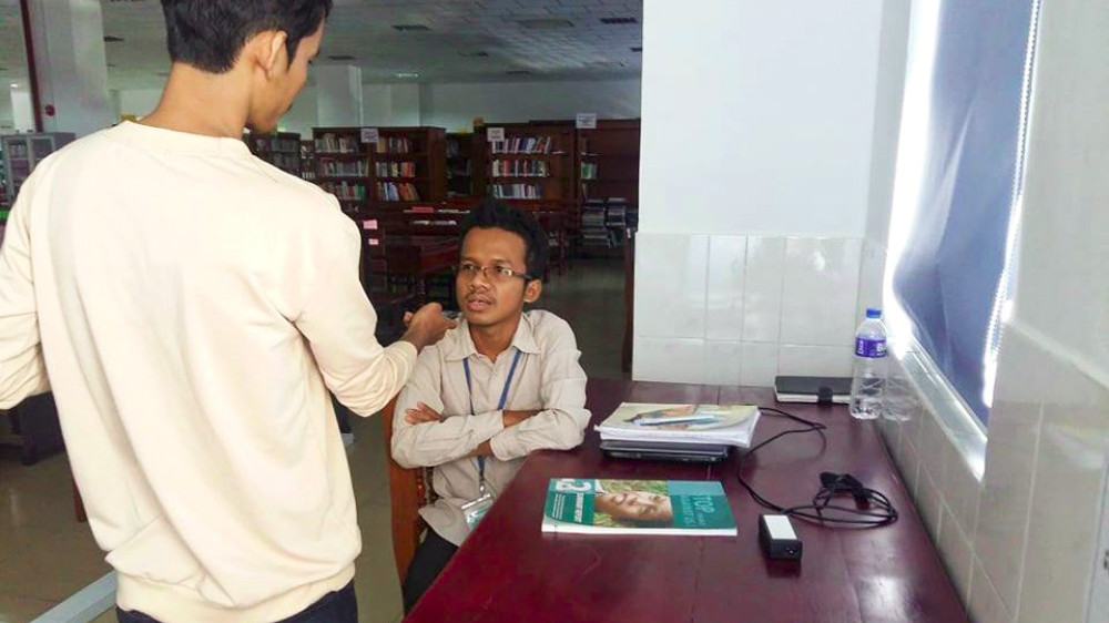 Student Mao Piseth is interviewed at the University of Cambodia library on September 6, 2019. (Ban Chantha)